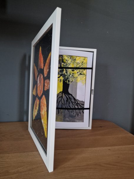 im praktischen Wechselbilderrahmen